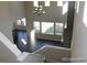 Open foyer boasts soaring ceilings, chandelier, and stairwell at 15305 W 93Rd Ave, Arvada, CO 80007