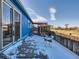 Home's backyard with snow-covered patio and gazebo at 6195 E 83Rd Pl, Commerce City, CO 80022