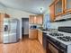 Kitchen with stainless steel appliances and granite countertops at 6195 E 83Rd Pl, Commerce City, CO 80022