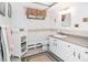 Well-lit bathroom with neutral finishes, a practical vanity, and essential amenities at 2130 Tabor Dr, Lakewood, CO 80215