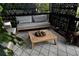 Stylish balcony featuring comfortable seating and a patterned rug for relaxation at 6985 Fallon Cir, Castle Rock, CO 80104
