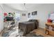 Bedroom featuring light walls, ceiling fan, and sports paraphernalia at 6985 Fallon Cir, Castle Rock, CO 80104