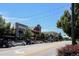 Streetscape of downtown Castle Rock showcasing shops, restaurants, and mature trees at 6985 Fallon Cir, Castle Rock, CO 80104