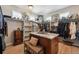 Walk-in closet features custom shelves, ample space for clothes and accessories, and large windows for natural light at 6985 Fallon Cir, Castle Rock, CO 80104