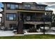 Spacious home featuring a patio and deck for outdoor entertaining and relaxation at 6985 Fallon Cir, Castle Rock, CO 80104