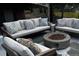 Inviting outdoor seating area with a modern fire pit at 6985 Fallon Cir, Castle Rock, CO 80104