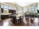 Open-concept kitchen and living area with a large island and hardwood floors at 10243 Spring Green Dr, Englewood, CO 80112