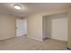 View of neutral bedroom with carpet, closet, and doorway at 6719 E Costilla Cir, Centennial, CO 80112