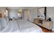 Spacious bedroom offers natural light, hardwood floors, a comfortable design, and neutral colors at 6719 E Costilla Cir, Centennial, CO 80112