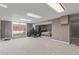 The basement features carpet, a bed, and access to outside at 4808 S Ward Way, Morrison, CO 80465