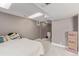 The unfinished basement has carpeting and boxes at 4808 S Ward Way, Morrison, CO 80465