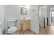 Bright bathroom with updated vanity and fixtures provides a functional and stylish space at 4808 S Ward Way, Morrison, CO 80465