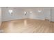 Spacious bedroom with light walls, recessed lighting, and wood floors at 4808 S Ward Way, Morrison, CO 80465