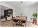 Dining area with table, chairs, and view to living room at 4808 S Ward Way, Morrison, CO 80465
