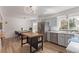Kitchen with stainless steel appliances, an island and access to the dining room at 4808 S Ward Way, Morrison, CO 80465