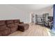 Open living room features wood floors and space for entertainment and relaxation at 4808 S Ward Way, Morrison, CO 80465