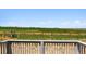 View of the backyard featuring a fence and grass area at 1281 Loraine N Cir, Lafayette, CO 80026