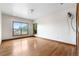 A standard bedroom features bright, natural light and hardwood floors throughout at 1195 W 70Th Ave, Denver, CO 80221