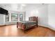 Spacious bedroom with a bay window and hardwood floors providing warmth and character at 1195 W 70Th Ave, Denver, CO 80221