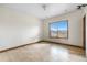 Bright bedroom featuring wood floors, large window and ample space at 1195 W 70Th Ave, Denver, CO 80221
