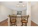 Kitchen's breakfast bar offers seamless flow to living space, perfect for entertaining, with stylish pendant lighting at 745 S Alton Way # 7A, Denver, CO 80247