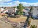 Spacious backyard featuring mature trees and a well-maintained lawn area at 8815 W Quarto Cir, Littleton, CO 80128