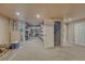 Finished basement featuring shelving, neutral carpet, and storage at 1166 Belgian Trl, Elizabeth, CO 80107