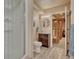 Bathroom featuring a walk-in shower and a sink at 1166 Belgian Trl, Elizabeth, CO 80107