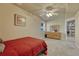 Bedroom featuring a dresser, ceiling fan, and neutral carpet at 1166 Belgian Trl, Elizabeth, CO 80107