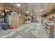 Garage featuring a work area and storage at 1166 Belgian Trl, Elizabeth, CO 80107