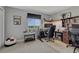 Office featuring a view of the golf course, gray walls, and built in shelving at 1166 Belgian Trl, Elizabeth, CO 80107