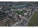 Aerial view of community featuring lush green spaces and a serene lake at 655 S Alton Way # 5C, Denver, CO 80247