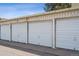 Exterior view of garages, offering secure parking and storage solutions for residents at 655 S Alton Way # 5C, Denver, CO 80247