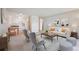 Inviting living room with neutral tones and stylish furnishings adjacent to the bright kitchen at 655 S Alton Way # 5C, Denver, CO 80247