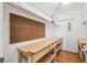 Versatile workspace or storage room with a workbench and shelving at 655 S Alton Way # 5C, Denver, CO 80247