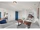 Finished basement features an office nook, comfortable seating, and plenty of natural light at 10200 Xanadu St, Commerce City, CO 80022