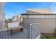 A comfortable deck with modern railings, offering a relaxing space for outdoor seating and enjoyment at 10200 Xanadu St, Commerce City, CO 80022