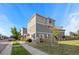 Charming two-story home with landscaped yard and a modern exterior paint scheme at 10200 Xanadu St, Commerce City, CO 80022