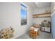 Bright playroom with large window, shelving, furniture and decor at 10200 Xanadu St, Commerce City, CO 80022