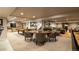Finished basement with a pool table, foosball table, a seating area, and a round dining table at 4483 W Cottonwood Pl, Littleton, CO 80123