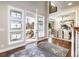 Grand foyer with hardwood floors, large windows and detailed trim work at 4483 W Cottonwood Pl, Littleton, CO 80123