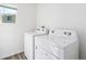Laundry room equipped with white, modern appliances at 22113 E 38Th Pl, Aurora, CO 80019