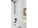 Updated bathroom with sleek black shower fixtures at 3600 S Pierce St # 7-201, Denver, CO 80235