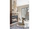 Cozy living room fireplace with stone surround and modern decor at 3600 S Pierce St # 7-201, Denver, CO 80235