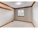 Bright bedroom with natural light, neutral carpet, and classic trim, offers a serene retreat at 9754 Las Colinas Dr, Lone Tree, CO 80124