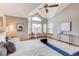 Spacious main bedroom with vaulted ceilings, plush rug, and large windows providing great natural light at 9754 Las Colinas Dr, Lone Tree, CO 80124