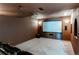 Home theater room with large screen, projector, and cozy seating, perfect for movie nights at 9754 Las Colinas Dr, Lone Tree, CO 80124