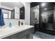 Modern bathroom with a glass-enclosed shower and stylish vanity at 1900 E Girard Pl # 505, Englewood, CO 80113
