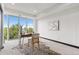 A bright bedroom featuring large windows and stylish furniture, creating a cozy and inviting space at 1900 E Girard Pl # 505, Englewood, CO 80113
