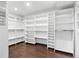Large walk-in closet with ample shelving and hanging space, great for organization at 1900 E Girard Pl # 505, Englewood, CO 80113